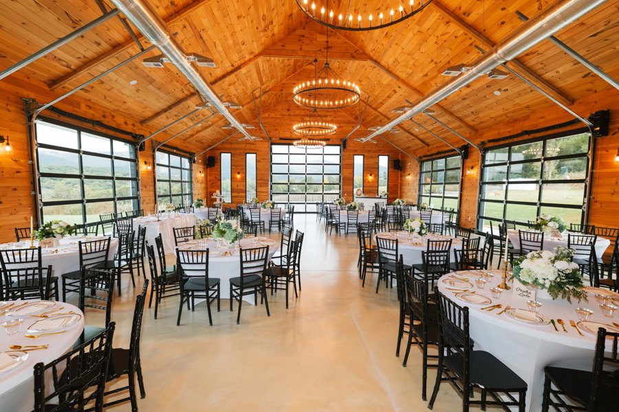 The Grand Hall, chandeliers lit and tables set